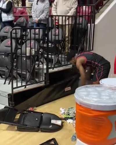 Jamal Shead cleaning up after his squad following a controversial loss to Alabama