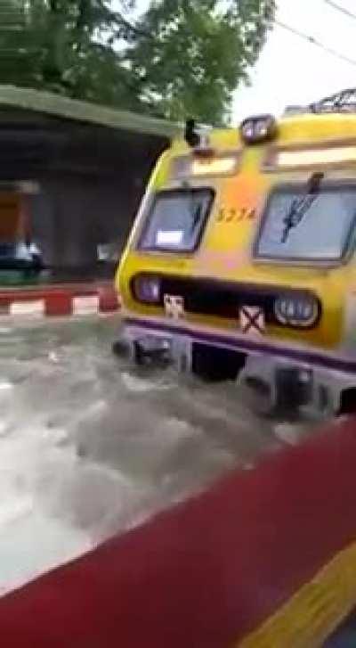 You know it's monsoon season in India, when trains are surfing. [JK]