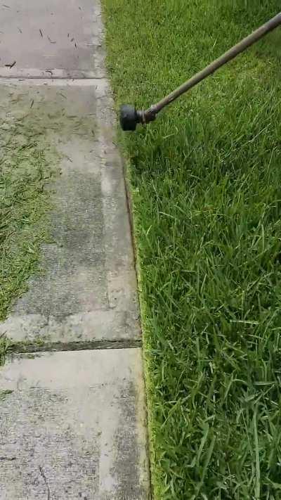 Edging lawn with string trimmer