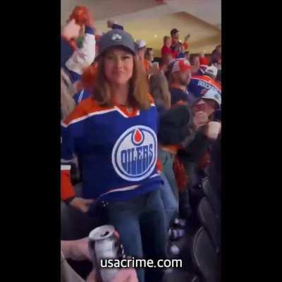 Edmonton Oilers fan flashes in the crowd 