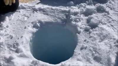 Sounds made by dropping chunk of ice down 450m deep hole!