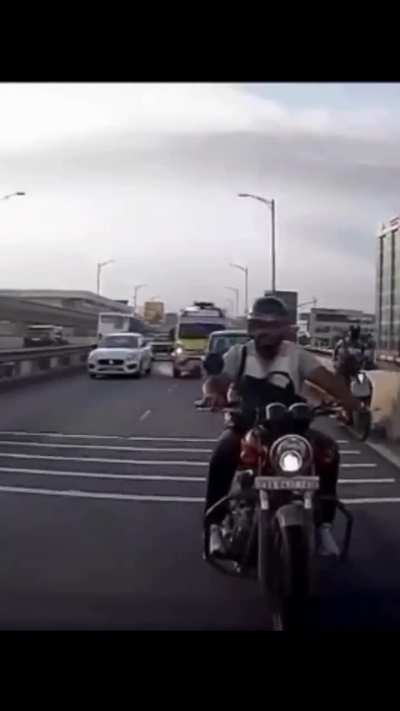 An ambulance hits a car on the flyover 