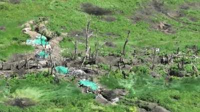 Ukrainian Humvee squad assault enemy trench. Russians can be seen getting shot when they attempt to flee. Location unknown.