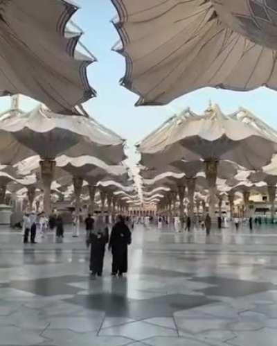 Umbrellas from makkah/medina opening in perfect synchronization