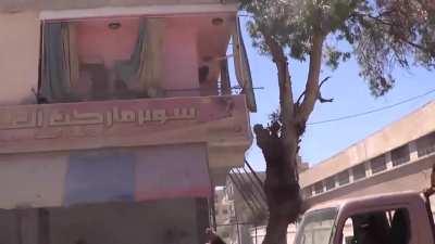 Interesting over-the-shoulder look at an FSA technical in use engaging SAA positions - Daraa al-Mahatta - 5/27/2013