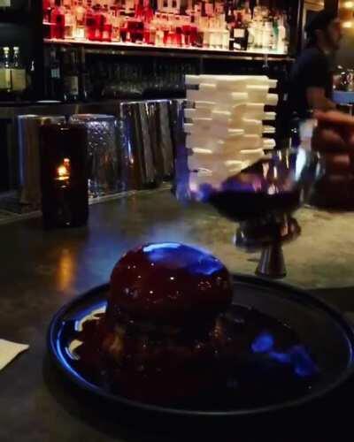 Pouring fire on a burger