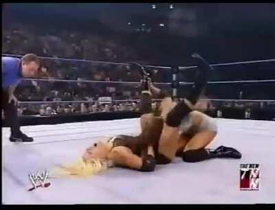 Dawn Marie headbutting Torrie Wilson downstairs