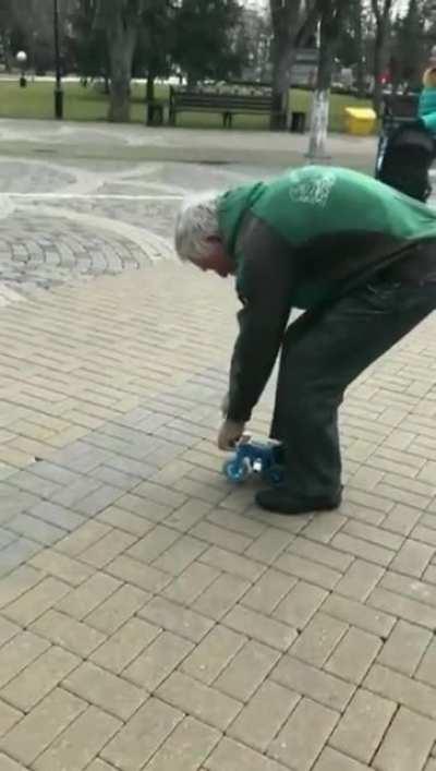 Guy riding tiny bicycle