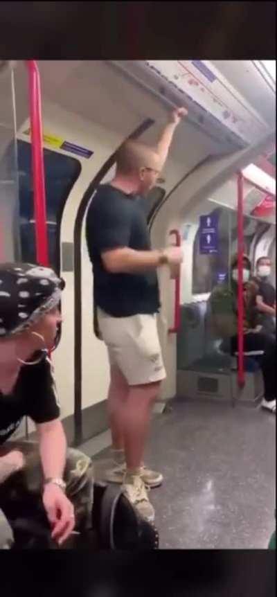 Man is being racist on the subway. Gets absolutely LAMPED