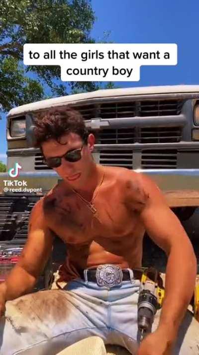 What the hell is he drilling? Did he dirty himself up and fake fixing on a car for a tik tok thirst trap?