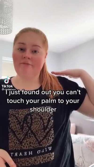 Try to touch your hand to your shoulder