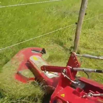 Mower that doesn't leave grass around posts