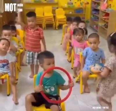 Courtesy lesson taught in school to children. Vietnam 2021