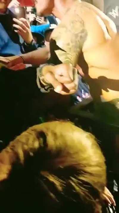 Randy Orton saves child from being crushed by crowd