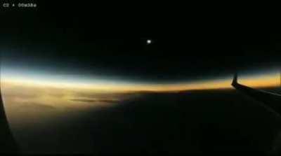 Solar eclipse seen mid-flight