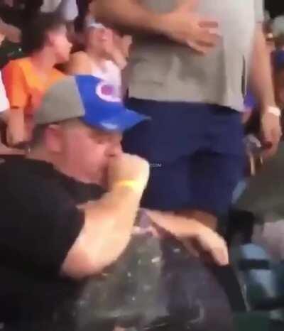 Baseball fan cannot stop puking all over himself