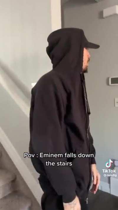 Eminem falls down the stairs