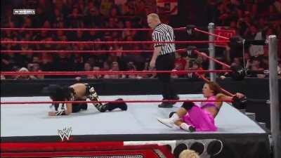 Melina lands on Mickie James' knees