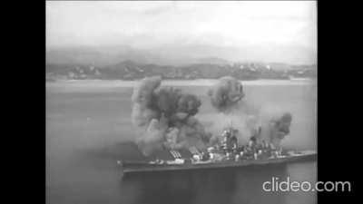 [USS New Jersey] firing a full broadside. Korea, 1951