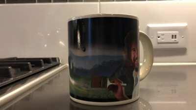 My new Bob Ross mug after pouring hot water into it