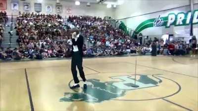 Kid wins school talent competition by performing MJ's Billie Jean.