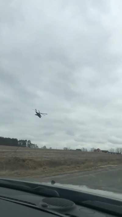 Close up of Russian helicopters flying towards Hostomel first day of the war