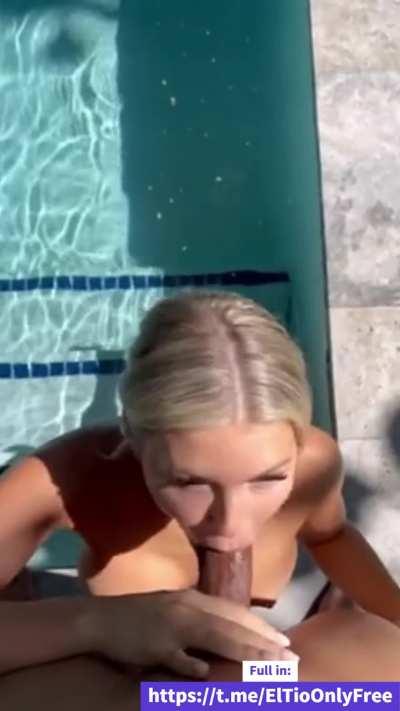 Blonde riding a cock outside the pool
