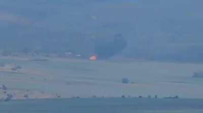 Reportedly a Russian helicopter being shot down by Ukrainian forces in the Donbass, June 2022.