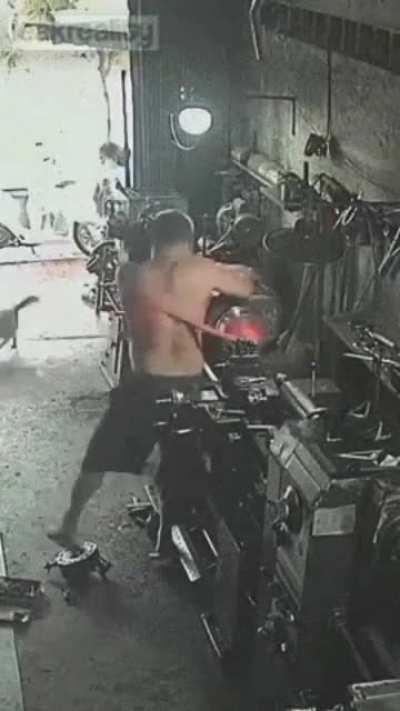 Man puts on shirt straight from the machine