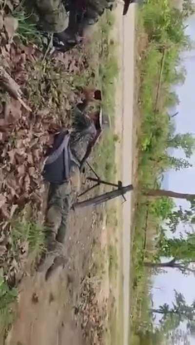 A cadre of the NSCN-IM (a group of the National Socialist Council of Nagaland) record themselves during the firefight with Kuki National Army Burma (a Myanmar branch of the KNA) near the Indian Border (Unknown date)