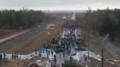 An absolute quintessence of Ukrainian bravery!!! An enormous amount of unarmed civilians is blocking the move of russist forces. Fascism won't be tolerated. We'll fight to the last drop of blood!!! Slava Ukraini!!!