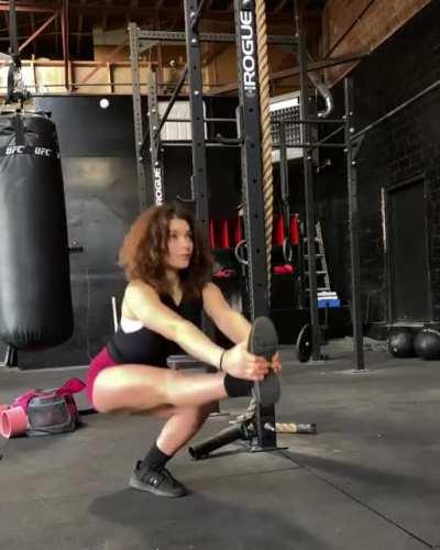 Extended leg pistol squats