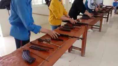 11th grade students in public schools in Vietnam are all taught how to disassemble and reassemble military rifles - Such as the AK-47, the class subject is called 