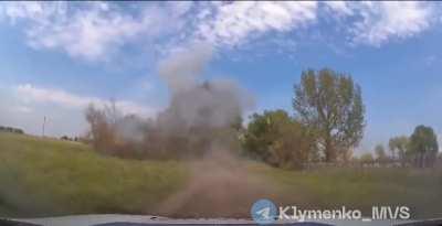 Dashcam on a Ukranian police car films another police car getting hit by a Russian FPV drone in Vovchansk, Kharkiv region