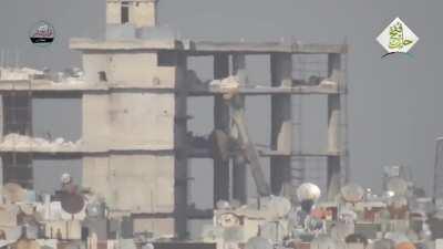 Opposition ATGM team engage a Syrian Army crane attempting to place a 57mm AA gun on the upper floors of a building - 2016