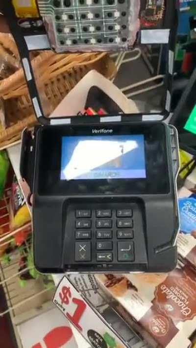 A debit card skimmer at a shady convenience store