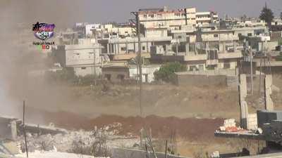 FSA IED attack on a passing Syrian Army pickup truck technical - Sheikh Maskin - 7/23/2014