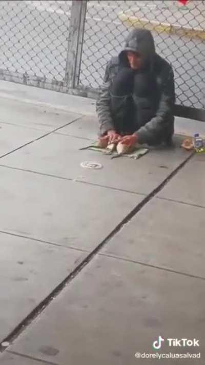 Homeless man teaches different rats multiple tricks.