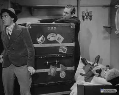 Groucho orders food for his stowaway guests (Chico, Harpo, Not-Gummo), then sees how many people they can squeeze into the smallest cabin aboard the ship. From the 1935 Marx Brothers film &quot;A Night at the Opera&quot;.