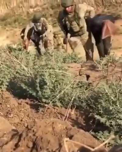 Turkish soldiers beating YPG terrorists in Syria. Date unknown.