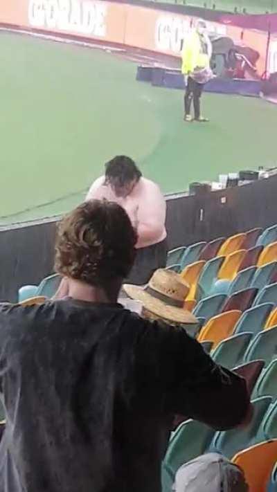 Dude enjoys the rain at the Cricket