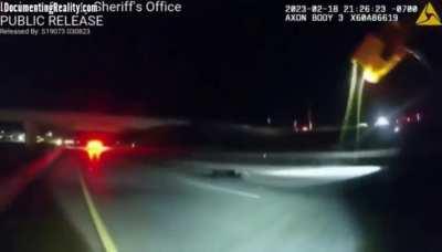 Deputy taze running suspect in the highway causing him to get run over