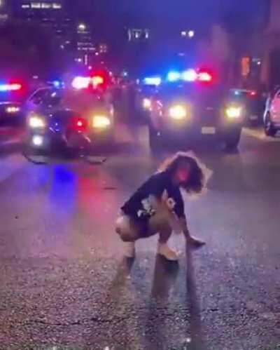 NSFW BLM protester strip teased police