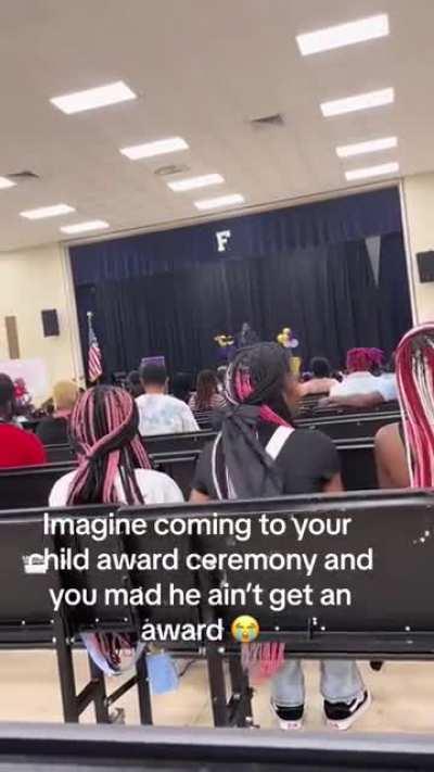 Parent throws a temper tantrum in the middle of an award ceremony because her kid didn’t get an award.