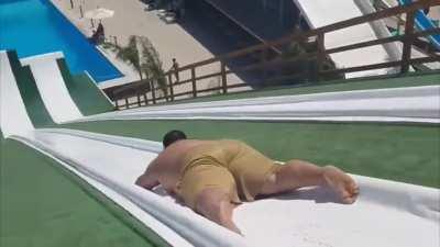 Man flies off water slide