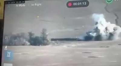 A Russian vehicle struck a mine, launching a rider into the air.