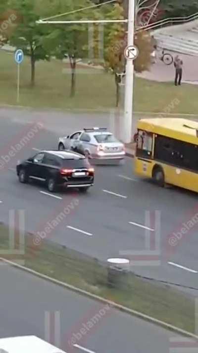 Ruthless policeman arbitrarily damaging passing car