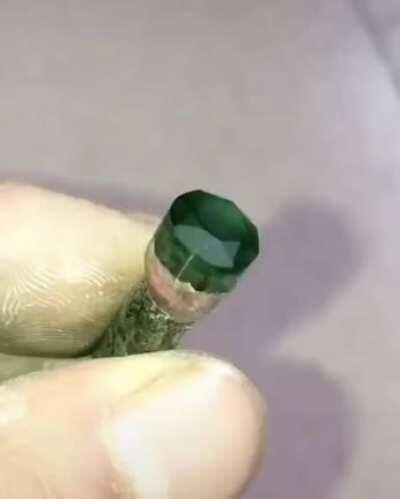 Making a gemstone from a broken piece from a bottle.