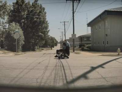 [Video] Old lady riding with her man in wheelchair