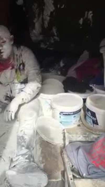 Painters hit breaks, throw coworker sitting in back into paint.